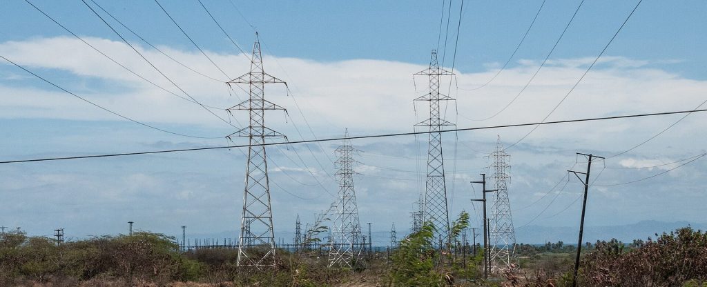 Power lines across an arid landscape